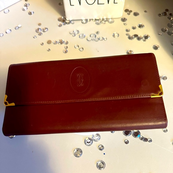 Cartier long wallet in great condition. Great red color with snap lock. - Picture 1 of 6